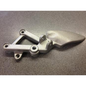 Кронштейн подножки левый Aprilia RS